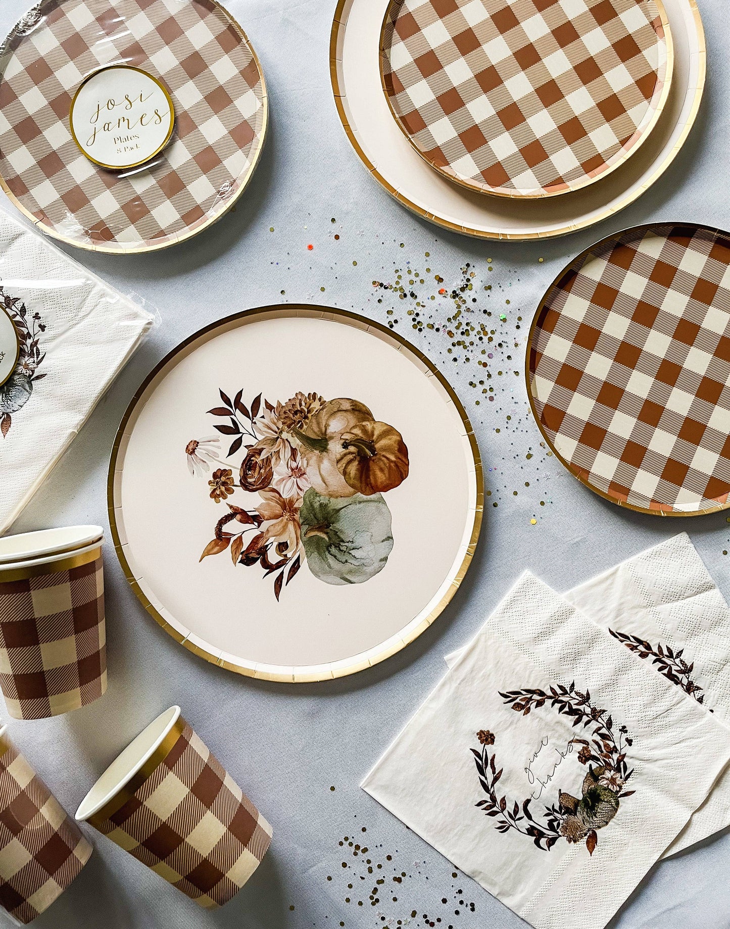 Autumn brown-ish round plaid paper plate with gold trim. Table set up. Pack of 8