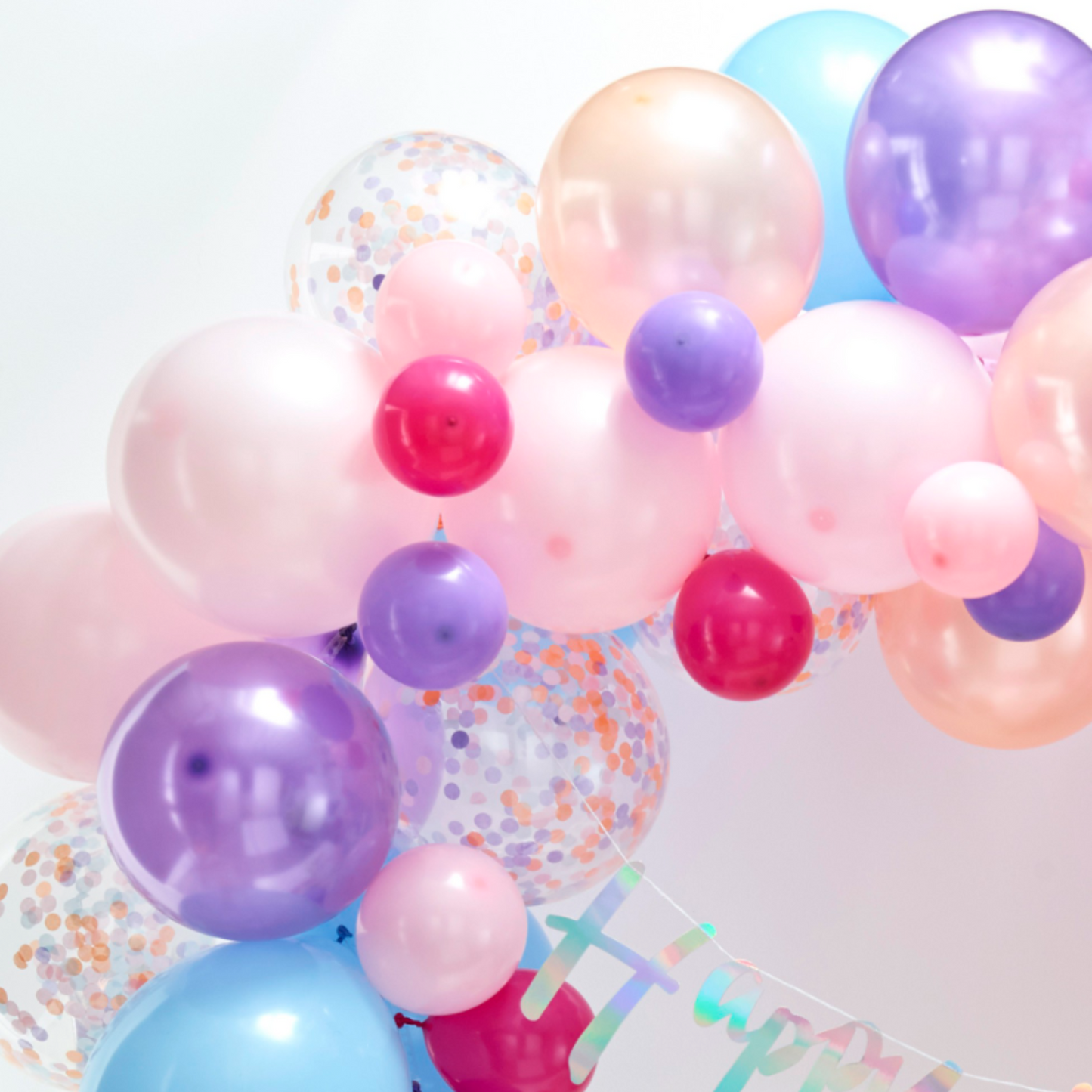 Pastel Balloon Arch Kit. 5inch and 12 inch DIY Pastel Balloon Arch Kit with purple, dark pink, light pink, blue and confetti balloons. Close up picture