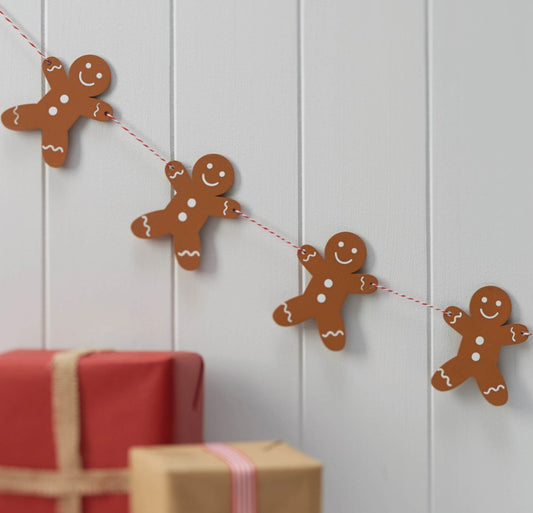 wooden gingerbread bunting with red and white strip twine