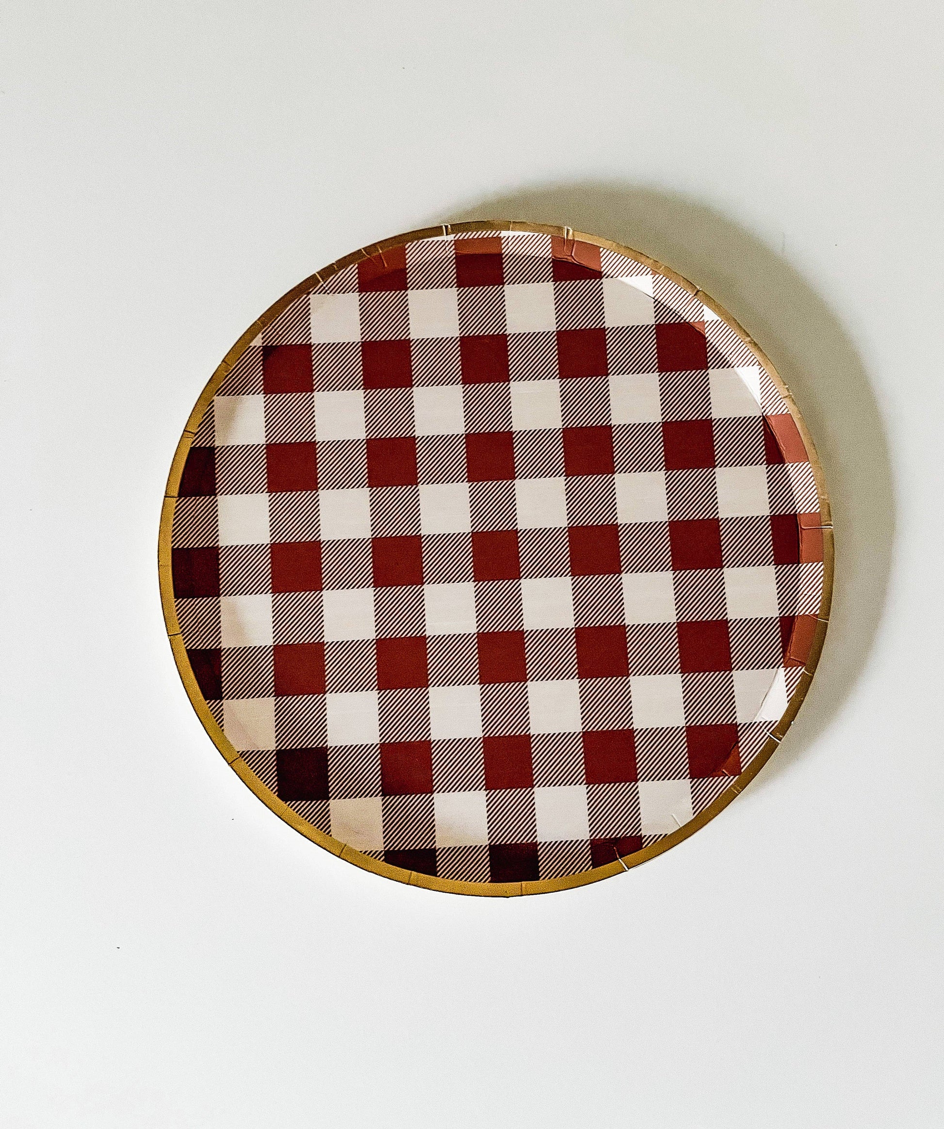 Autumn brown-ish round plaid paper plate with gold trim