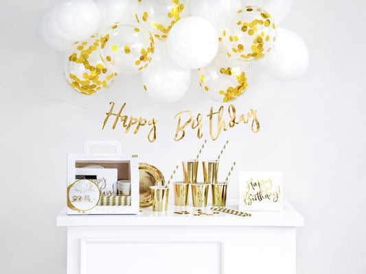 White & Gold Happy Birthday Theme Party Box. Each box has  Happy Birthday (1 piece), paper cups (6 pcs), paper plates (6 pcs), paper straws (10 pcs), paper napkins (20 pcs), confetti (15 g) and latex balloons (Pastel Pure White, 10 pcs and Crystal Clear, 6 pcs).